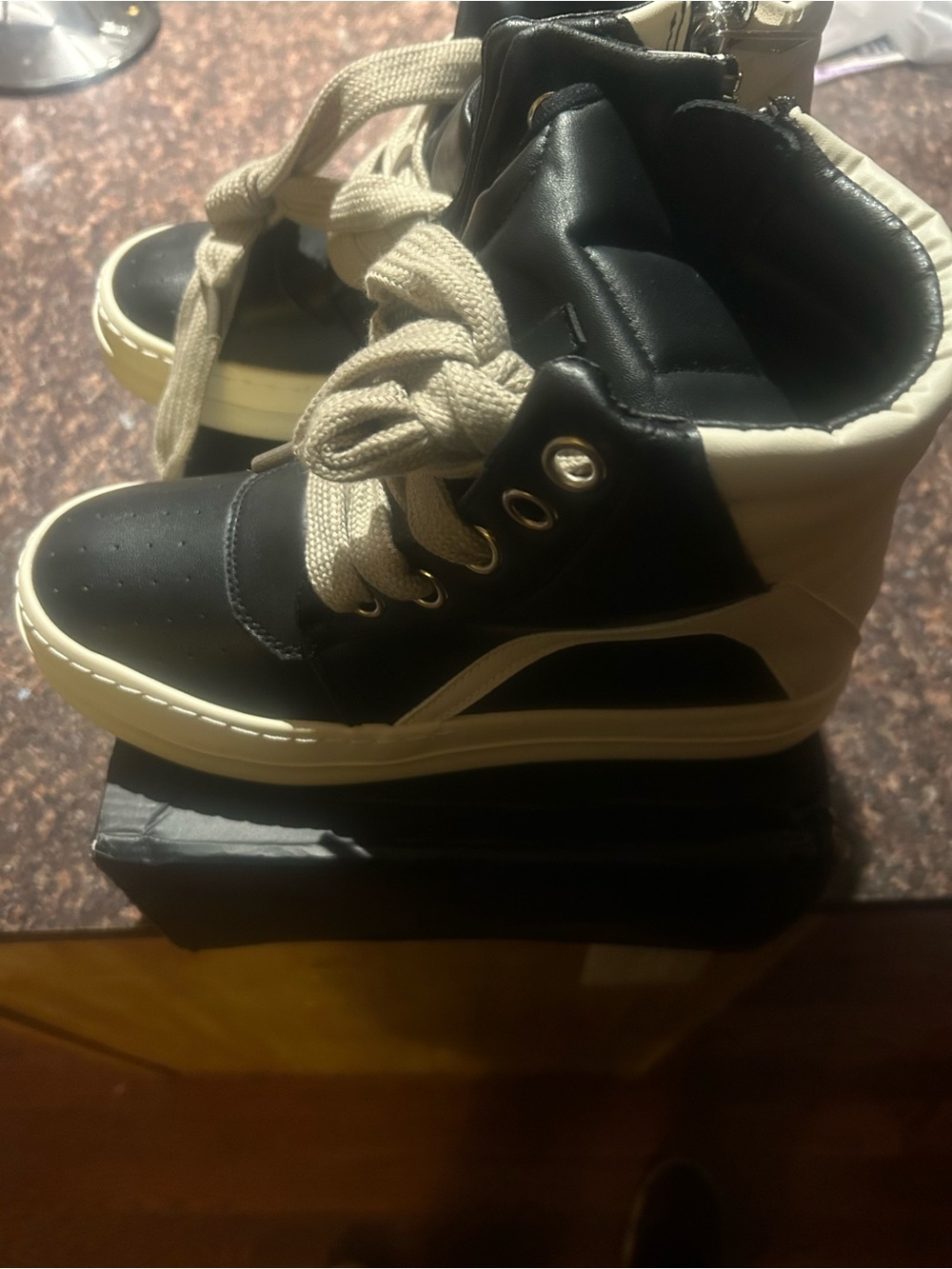 Rick Owens High-Top Sneakers in Black and Cream